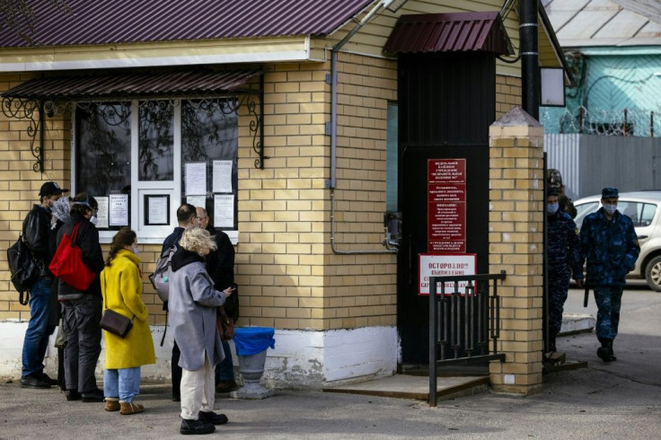 Alliance of Doctors union's leader Anastasia Vasilyeva and her colleagues wait next to the gate of the IK-3 penal colony where jailed Kremlin critic Alexei Navalny was reportedly transferred in the city of Vladimir