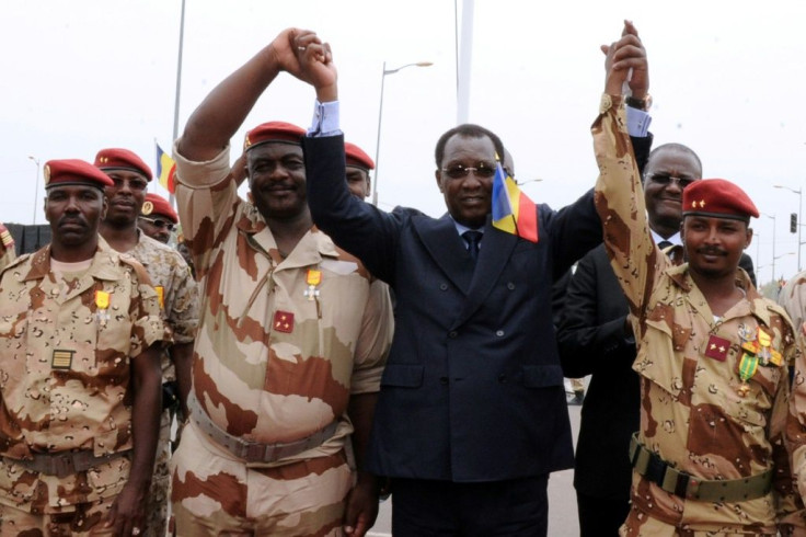Chad's President Idriss Deby Itno (centre) is pictured with Chadian army chiefs and his son Mahamat Idriss Deby (right) in 2013