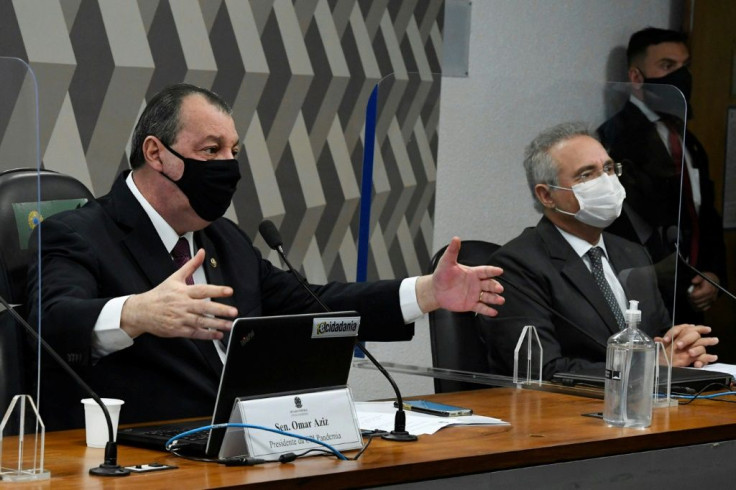 Brazilian senators Omar Aziz (left) and Renan Calheiros participate in the inquiry into the government's handling of the coronavirus pandemic on May 4, 2021