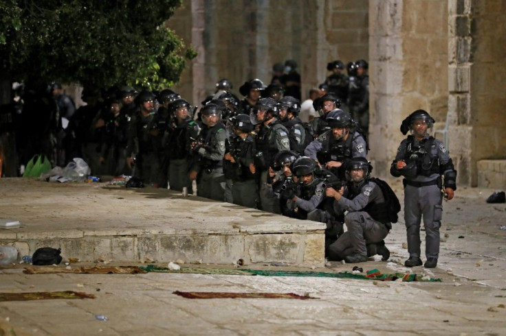 Israeli security forces deploy during clashes with Palestinian protesters at the al-Aqsa mosque compound in Jerusalem