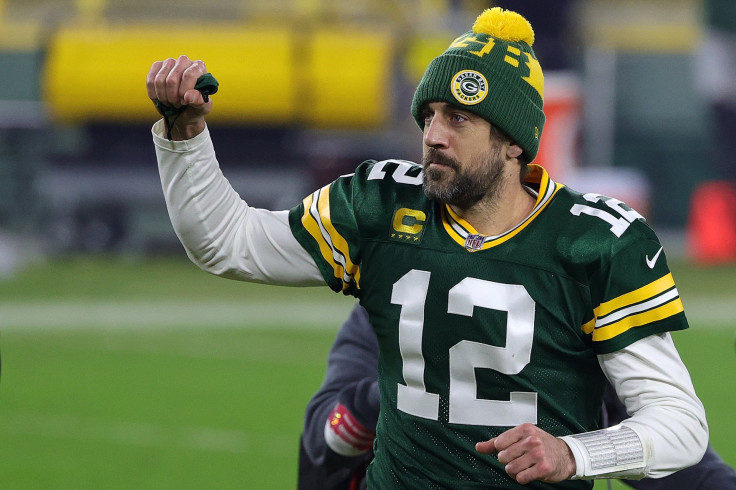 Aaron Rodgers #12 of the Green Bay Packers leaves the field following the NFC Divisional Playoff game against the Los Angeles Rams at Lambeau Field on January 16, 2021 in Green Bay, Wisconsin. 