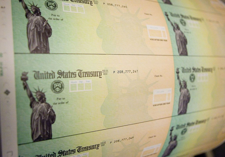 Economic stimulus checks are prepared for printing at the Philadelphia Financial Center May 8, 2008 in Philadelphia, Pennsylvania. One hundred and thirty million households are eligible to receive a tax rebate check under the $168 billion economic stimulu