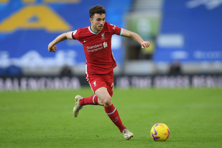 Diogo Jota of Liverpool in action during the Premier League match between Brighton & Hove Albion and Liverpool at American Express Community Stadium on November 28, 2020 in Brighton, England. Sporting stadiums around the UK remain under strict restriction