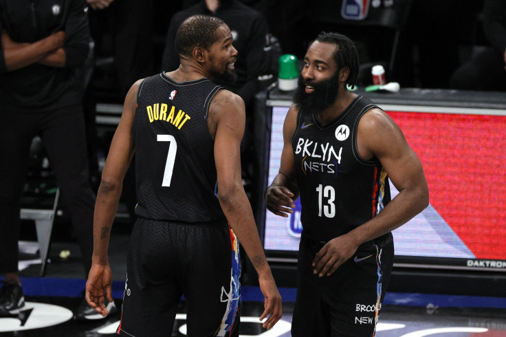 Kevin Durant #7 and James Harden #13 of the Brooklyn Nets react during the second half against the LA Clippers at Barclays Center on Feb. 2, 2021, in the Brooklyn borough of New York City.