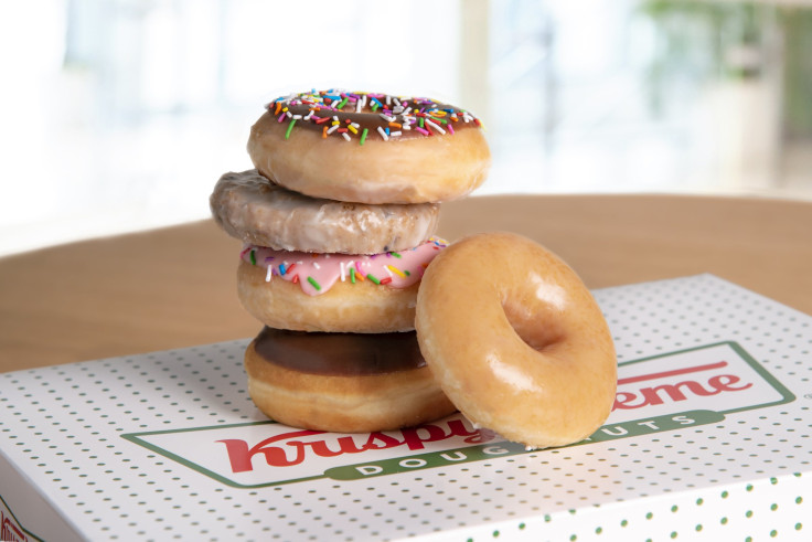 A variety of donuts from Krispy Kreme are pictured.