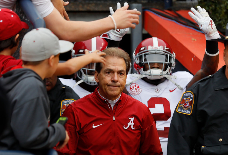 Head coach Nick Saban of the Alabama Crimson Tide leads his team on the field prior to the game against the Auburn Tigers at Jordan Hare Stadium on Nov. 25, 2017 in Auburn, Alabama.