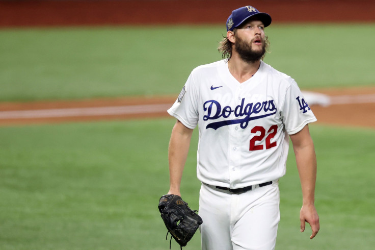 Clayton Kershaw #22 of the Los Angeles Dodgers returns to the dugout after retiring the side against the Tampa Bay Rays during the third inning in Game One of the 2020 MLB World Series at Globe Life Field on October 20, 2020 in Arlington, Texas. 