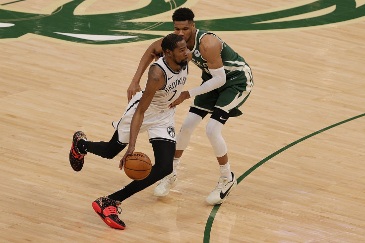 Kevin Durant #7 of the Brooklyn Nets is defended by Giannis Antetokounmpo #34 of the Milwaukee Bucks during the second half of Game Three of the Eastern Conference second round playoff series at the Fiserv Forum on June 10, 2021 in Milwaukee, Wisconsin. 