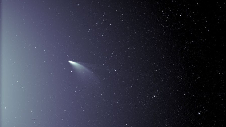 An unprocessed image from the WISPR instrument on board NASA's Parker Solar Probe shows comet NEOWISE on July 5, 2020, shortly after its closest approach to the Sun. The Sun is out of frame to the left. The faint grid pattern near the center of the image 