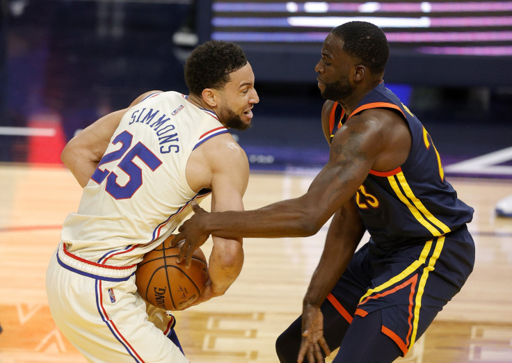Ben Simmons #25 of the Philadelphia 76ers is fouled by Draymond Green #23 of the Golden State Warriors at Chase Center on March 23, 2021 in San Francisco, California.