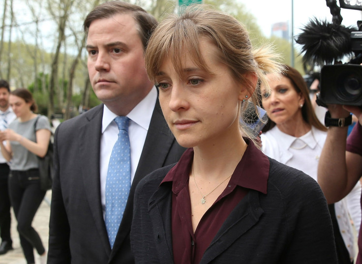 Actress Allison Mack (R) is pictured leaving the United States Eastern District Court after a bail hearing in relation to the sex trafficking charges filed against her on May 4, 2018 in the Brooklyn, New York.