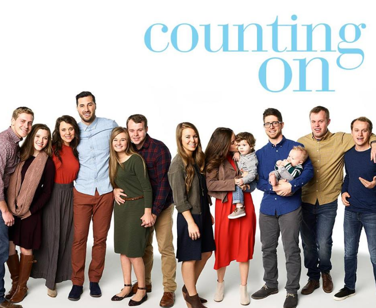 New photos of John-David Duggar with his girlfriend show the pair getting cozy.