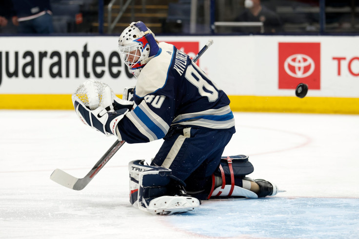 Matiss Kivlenieks #80 of the Columbus Blue Jackets warms up prior to the start of the game against the Detroit Red Wings at Nationwide Arena on May 7, 2021 in Columbus, Ohio.