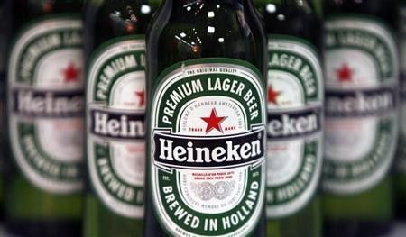 Bottles of Heineken beer are displayed before a news conference in London January 25, 2008.