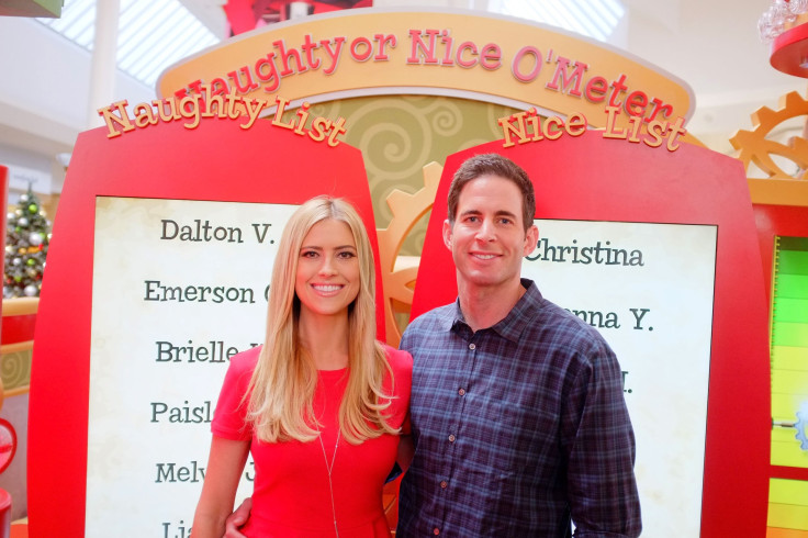 Tarek and Christina El Moussa, hosts of HGTV's hit show Flip or Flop, visited the HGTV Santa HQ at Lakewood Center in Lakewood, California, Dec. 13, 2014.