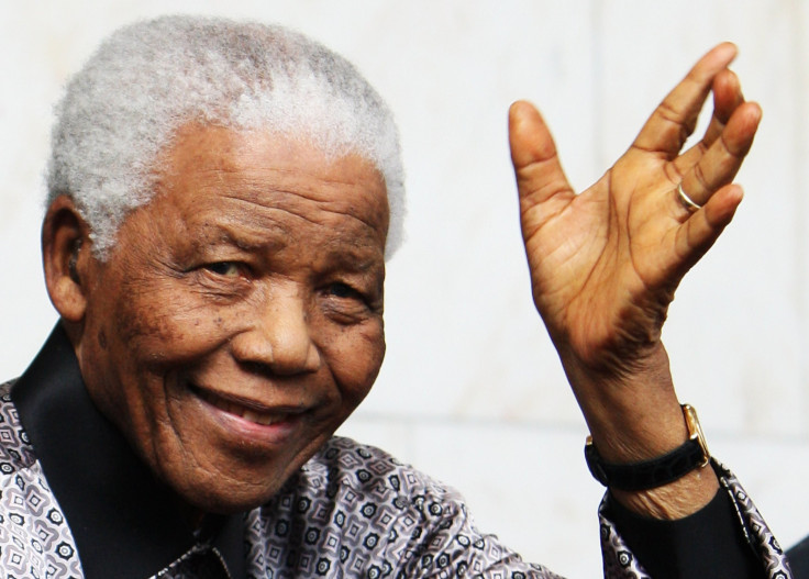 Nelson Mandela leaves the InterContinental Hotel after a photoshoot with celebrity photographer Terry O'Neil in London, England, June 26, 2008.