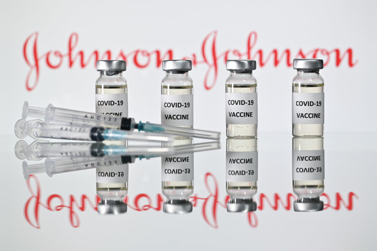 Vials of a COVID-19 Vaccine are pictured with the logo of US pharmaceutical company Johnson & Johnson on November 17, 2020.