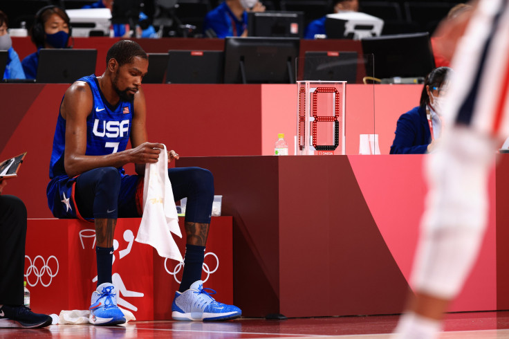 JULY 25: Kevin Durant #7 of Team United States sits on the bench in disappointment as time winds down in the United States' loss to France in the Men's Preliminary Round Group B game on day two of the Tokyo 2020 Olympic Games at Saitama Super Arena on Jul