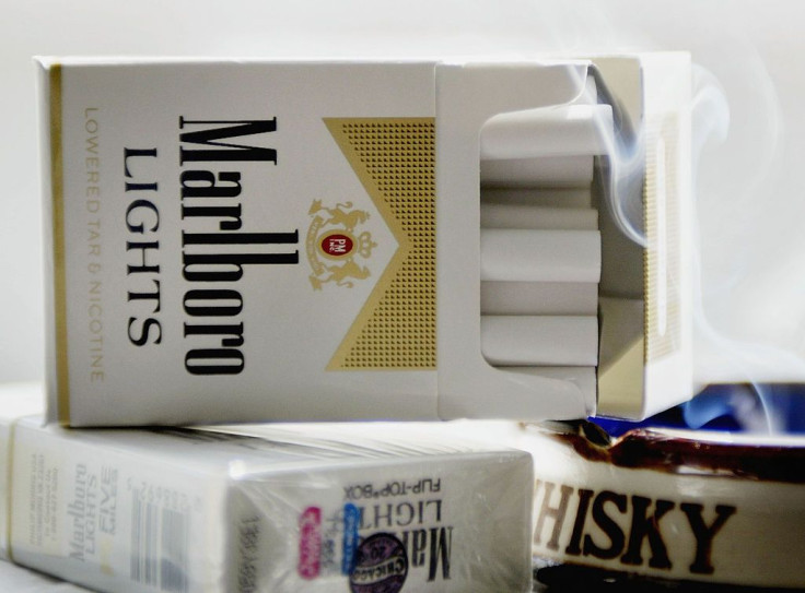 Cigarette maker Philip Morris USA announced it has started removing the controversial words "lowered tar and nicotine" from packages of Marlboro Lights 