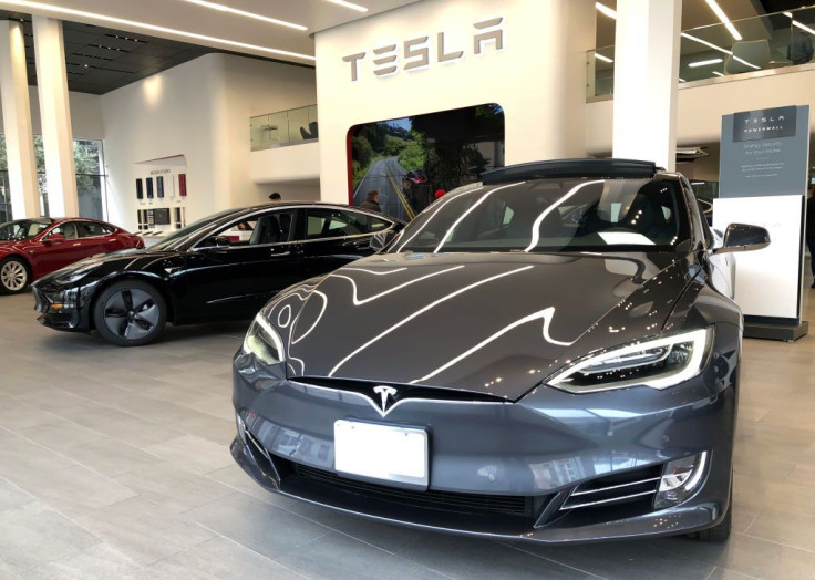 Brand new Tesla vehicles are displayed at a Tesla showroom in San Francisco, California. Tesla plans to shutter almost all of their retail showrooms and shift focus to online sales. 