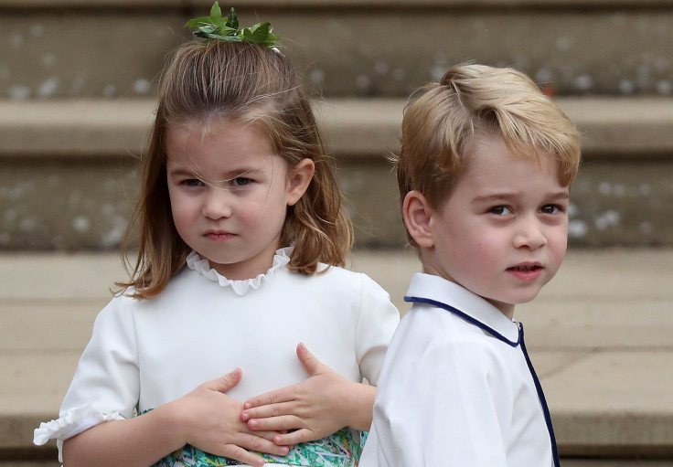 Pictured: Prince George (L) and his sister Princess Charlotte (R) arrive to attend the wedding of Britain's Princess Eugenie of York to Jack Brooksbank at St George's Chapel, Windsor Castle, in Windsor, on October 12, 2018.