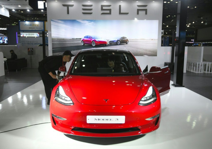 Electric carmaker Tesla said it boosted deliveries of its most affordable vehicle, the Model 3, as it delivered a surprise profit in the past quarter.