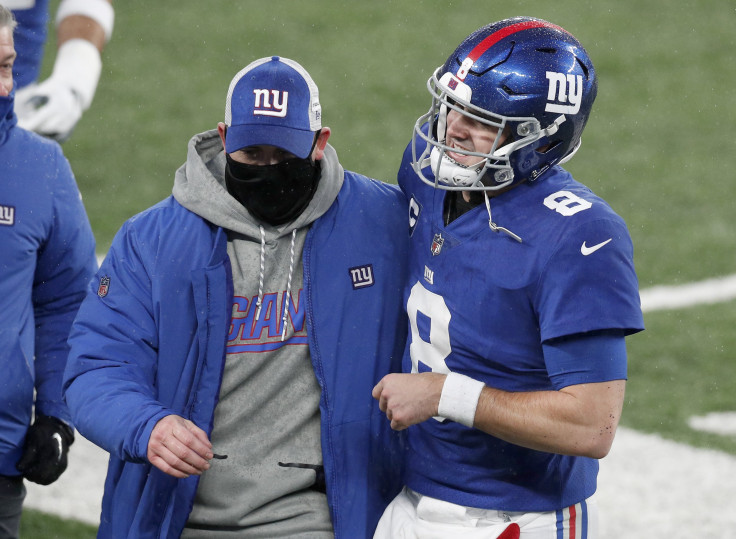 JANUARY 03: Head coach Joe Judge and Daniel Jones #8 of the New York Giants walk off the field after a game against the Dallas Cowboys at MetLife Stadium on January 03, 2021 in East Rutherford, New Jersey. The Giants defeated the Cowboys 23-19.