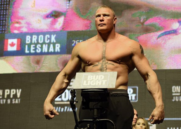Is Brock Lesnar still returning to the UFC after his win at Wrestlemania 34? In this picture, Lesnar poses on the scale during his weigh-in for UFC 200 at T-Mobile Arena in Las Vegas, July 8, 2016.