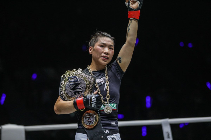 Inaugural ONE Women's Strawweight World Champion celebrates a victory.