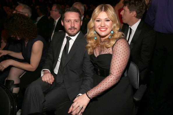 Kelly Clarkson brought her and Brandon Blackstock's daughters, Savannah and River Rose to the AMAs on Sunday night. Pictured: Blackstock, Clarkson attend the 55th Annual GRAMMY Awards at STAPLES Center on Feb. 10, 2013 in Los Angeles.