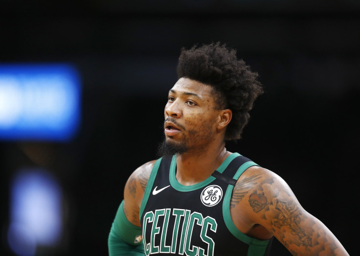 BOSTON, MASSACHUSETTS - MARCH 08: Marcus Smart #36 of the Boston Celtics looks on during the second quarter of the game against the Oklahoma City Thunder at TD Garden on March 08, 2020 in Boston, Massachusetts.