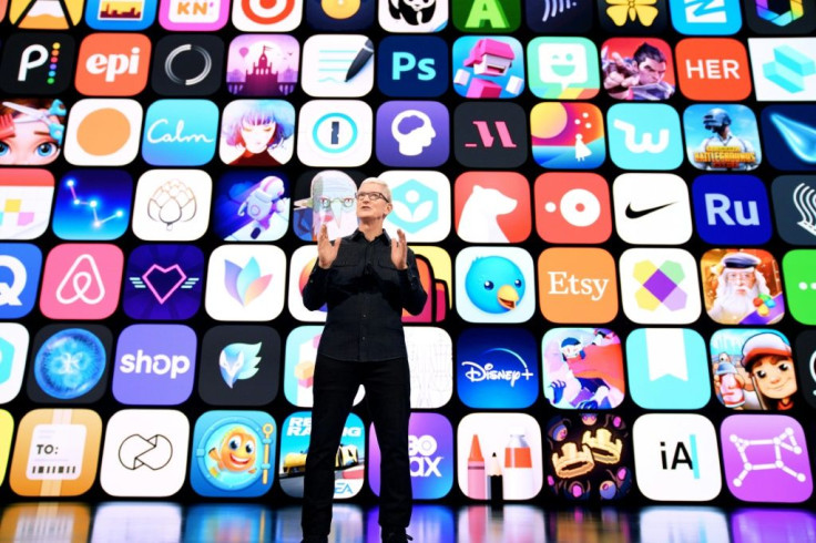 Apple CEO Tim Cook speaks to the Worldwide Developers Conference in June 2021. Apple's online marketplace got the largest share of a record spend on mobile apps in the first half of 2021, according to a market tracker