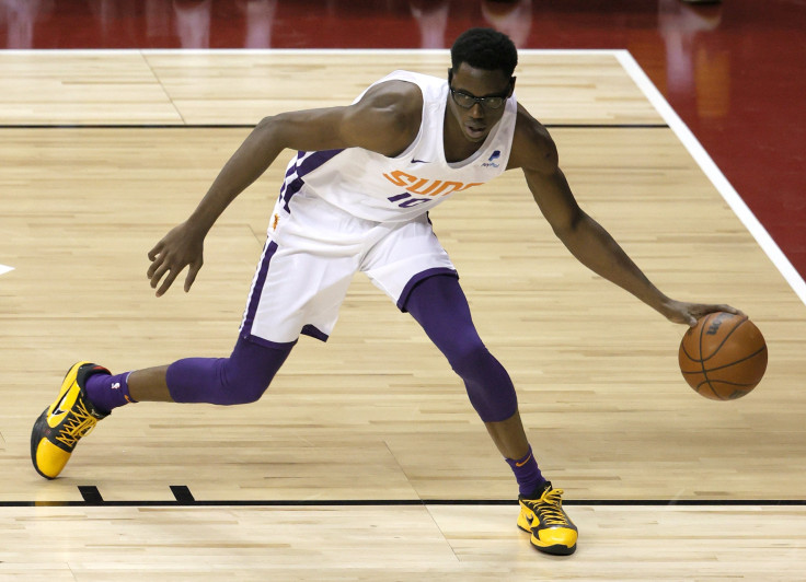 Jalen Smith #10 of the Phoenix Suns grabs a loose ball against the Los Angeles Lakers during the 2021 NBA Summer League at the Thomas & Mack Center on August 8, 2021 in Las Vegas, Nevada.