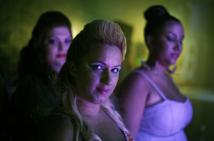 Contestants in an annual beauty pageant for plus-size women stand backstage in Beersheba, Israel, June 18, 2012.