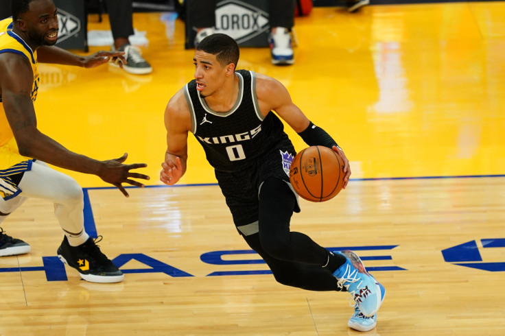 Tyrese Haliburton #0 of the Sacramento Kings handles the ball during the game against the Golden State Warriors at Chase Center on April 25, 2021 in San Francisco, California.