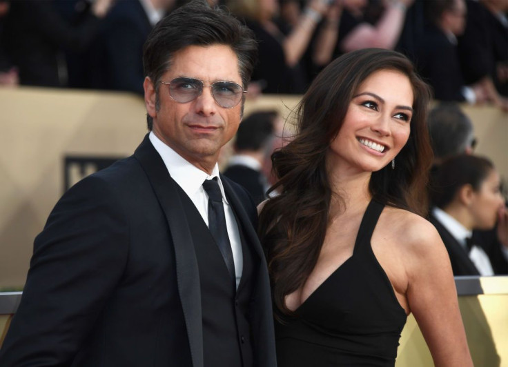 "Fuller House" actor John Stamos and wife Caitlin McHugh are spending their honeymoon at Disney World in Orlando, Florida. Pictured: Stamos and McHugh attend the 24th Annual Screen Actors Guild Awards at The Shrine Auditorium on Jan. 21, 2018 in Los Angel