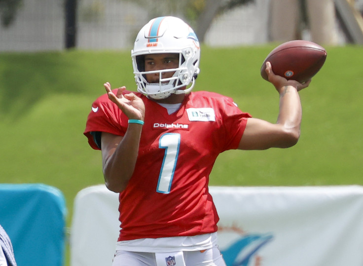 Tua Tagovailoa #1 of the Miami Dolphins throws the ball at the Baptist Health Training Complex on August 25, 2021 in Miami Gardens, Florida. 