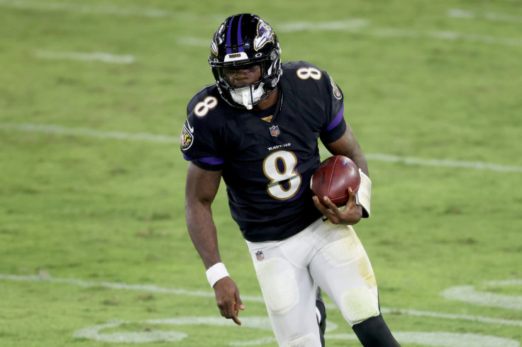 Quarterback Lamar Jackson #8 of the Baltimore Ravens rushes the ball against the Kansas City Chiefs in the second half at M&T Bank Stadium on September 28, 2020 in Baltimore, Maryland. 