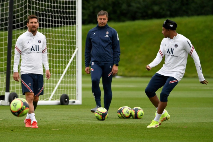 Lionel Messi and Kylian Mbappe at training last week, but will they ever actually play together for PSG?