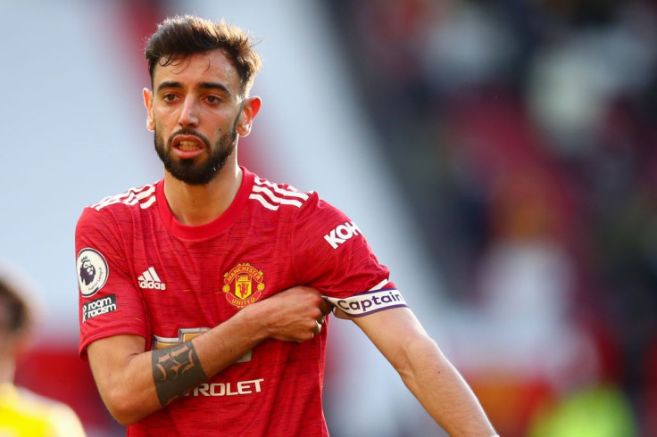 Bruno Fernandes of Manchester United adjusts the captains armband during the Premier League match between Manchester United and Fulham at Old Trafford on May 18, 2021 in Manchester, United Kingdom.
