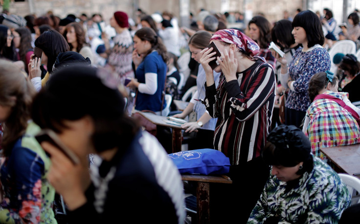 In this photo, Religious Jewish women pray at the women's section of the Western Wall in the Old City of Jerusalem on Sep. 28, 2017. 
