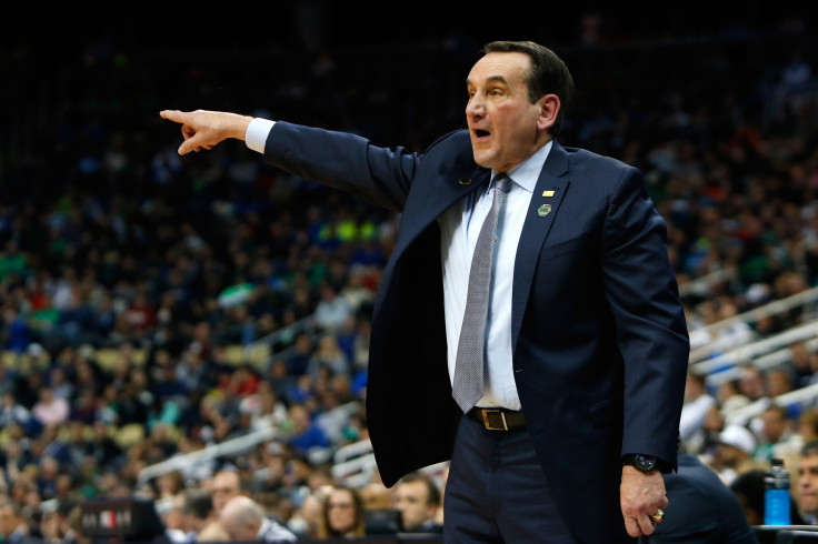 Duke is favored to win the 2019 NCAA Tournament. Pictured: Head coach Mike Krzyzewski of the Duke Blue Devils shouts against the Rhode Island Rams during the second half in the second round of the 2018 NCAA Men's Basketball Tournament at PPG PAINTS Arena