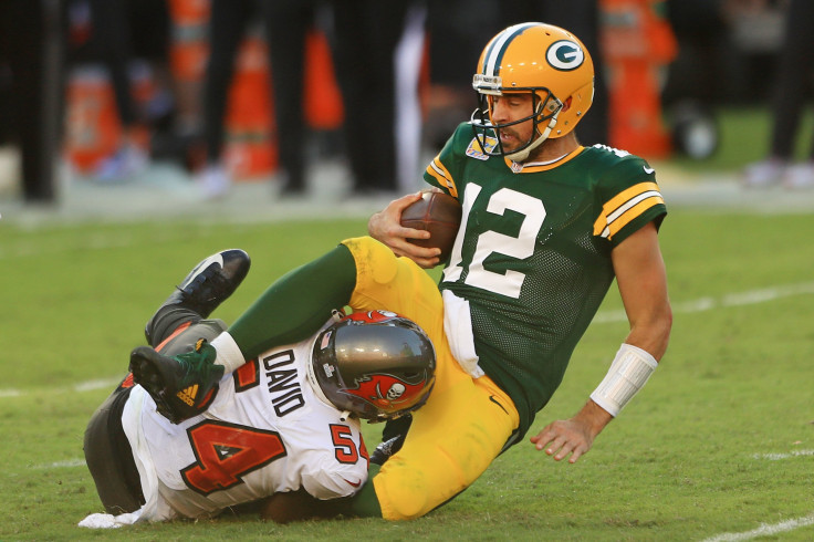 Aaron Rodgers #12 of the Green Bay Packers is sacked by Lavonte David #54 of the Tampa Bay Buccaneers during the second quarter at Raymond James Stadium on October 18, 2020 in Tampa, Florida. 