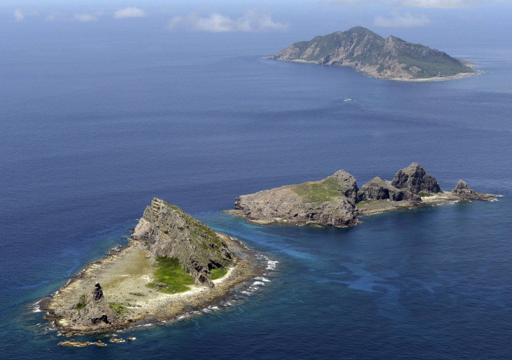 File image of the group of disputed islands, Uotsuri island (top), Minamikojima (bottom) and Kitakojima, known as Senkaku in Japan and Diaoyu in China is seen in the East China Sea