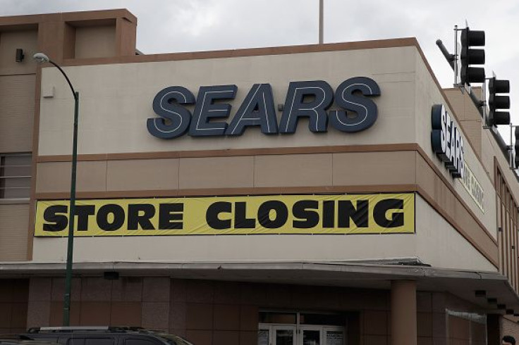 A sign announcing the store will be closing hangs above a Sears store on Aug. 24, 2017, in Chicago.