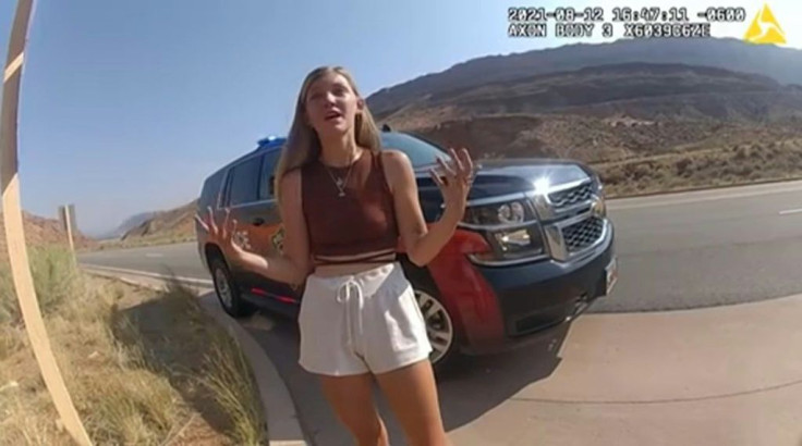 This August 12, 2021, still image from a police bodycam released by the Moab City Police Department in Utah, shows Gabrielle Petito speaking with police as they responded to an altercation between Petito and her boyfriend, Brian Laundrie