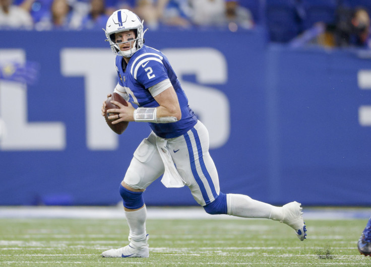 Carson Wentz #2 of the Indianapolis Colts runs the ball during the game against the Los Angeles Rams at Lucas Oil Stadium on Sept. 19, 2021, in Indianapolis, Indiana.