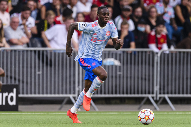 Aaron Wan-Bissaka of Manchester United runs with the ball during the UEFA Champions League group F match between BSC Young Boys and Manchester United at Stadion Wankdorf on September 14, 2021 in Bern, Switzerland.