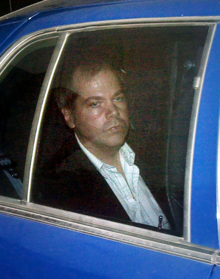 John Hinckley Jr. arrives at the E. Barrett Prettyman U.S. District Court in Washington, in this November 19, 2003 file photo. A U.S. federal judge begins hearings April 22, 2015 on whether would-be presidential assassin Hinckley Jr. could get more time o