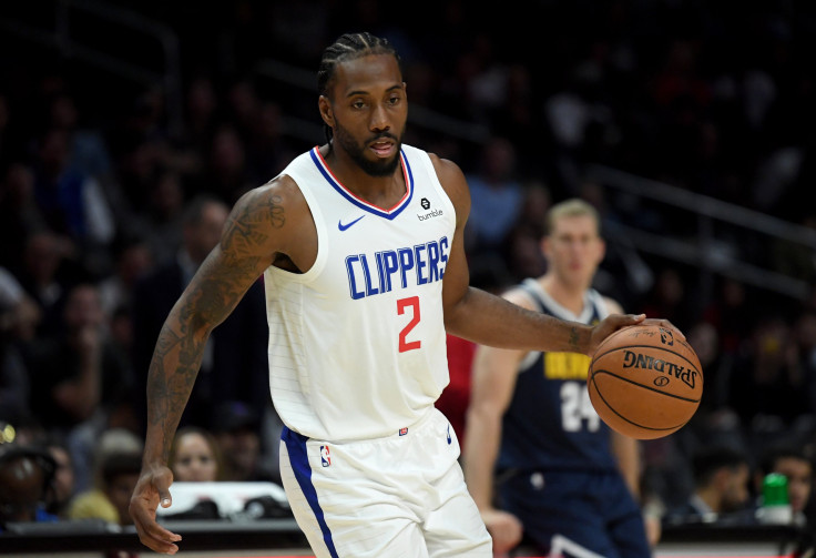 Kawhi Leonard #2 of the LA Clippers dribbles during a 111-91 Denver Nuggets preseason win at Staples Center on October 10, 2019 in Los Angeles, California.
